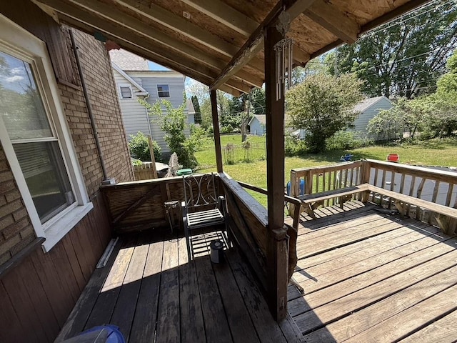 1711 S 4th St, Rockford, IL 61104 - wooden deck featuring a yard