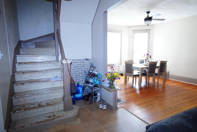 1711 S 4th St, Rockford, IL 61104 - staircase featuring a ceiling fan