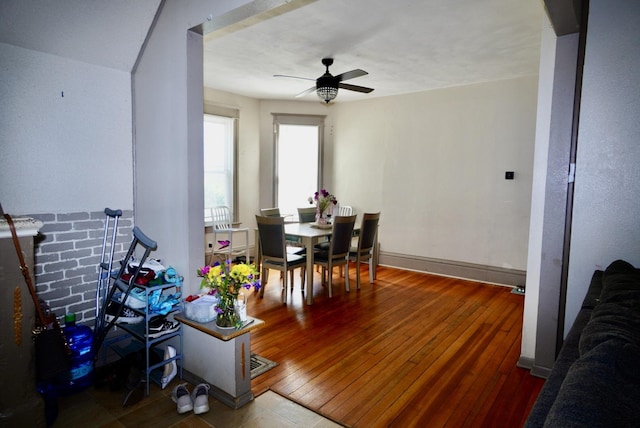 1711 S 4th St, Rockford, IL 61104 - dining room with hardwood / wood-style flooring, a ceiling fan, and baseboards