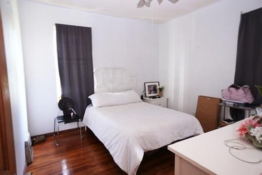 1711 S 4th St, Rockford, IL 61104 - bedroom with wood finished floors and a ceiling fan
