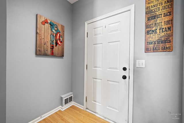2015 Limestone Ln, Carpentersville, IL 60110 - doorway to outside featuring light wood-type flooring and baseboards