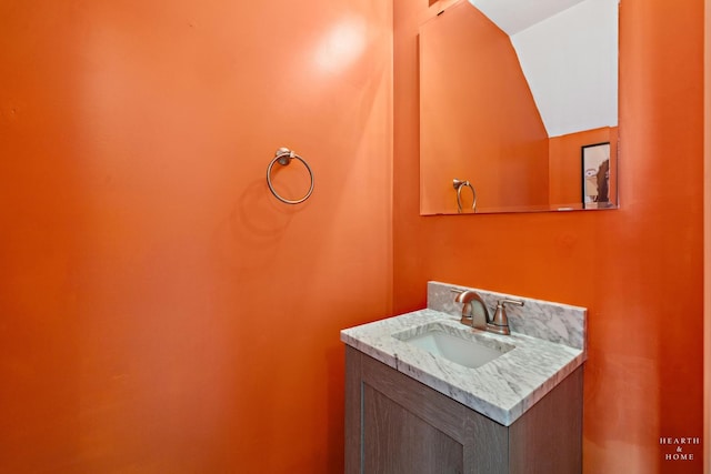 2015 Limestone Ln, Carpentersville, IL 60110 - bathroom featuring vanity and vaulted ceiling