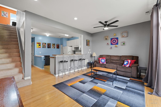 2015 Limestone Ln, Carpentersville, IL 60110 - living room with a ceiling fan, light wood finished floors, recessed lighting, stairway, and baseboards