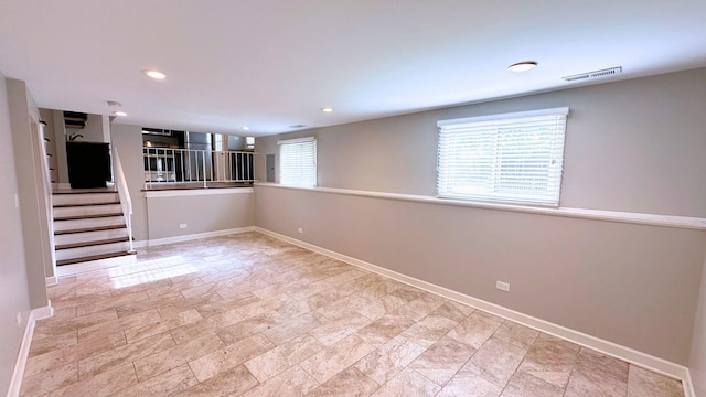 22500 Pleasant Dr, Richton Park, IL 60471 - spare room featuring baseboards, stone finish floors, stairway, and recessed lighting