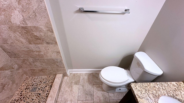 22500 Pleasant Dr, Richton Park, IL 60471 - full bathroom with tiled shower, toilet, vanity, and baseboards