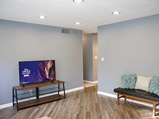 1216 Townley Dr, Bloomington, IL 61704 - living area with wood finished floors and recessed lighting
