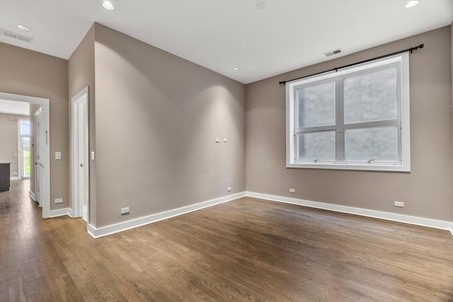 6 N May St Unit 403, Chicago, IL 60607 - spare room featuring wood finished floors, baseboards, and recessed lighting