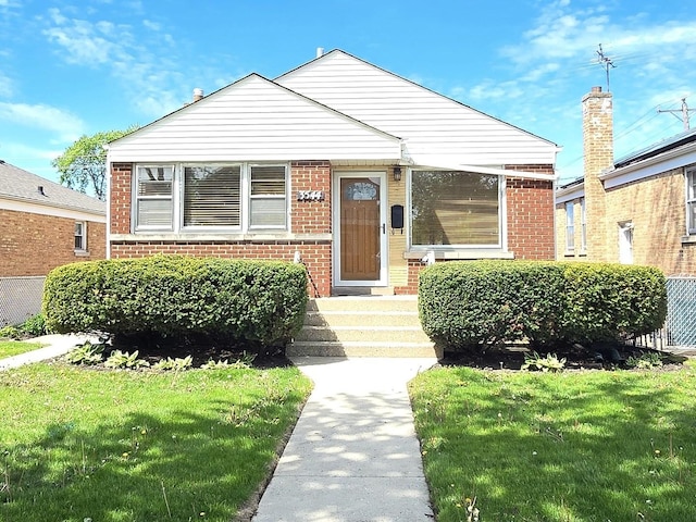 3544 Louis St, Franklin Park, IL 60131 - bungalow featuring brick siding and a front yard