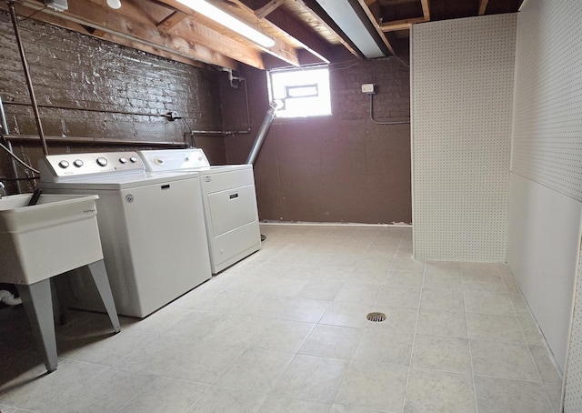 3544 Louis St, Franklin Park, IL 60131 - washroom with washing machine and clothes dryer and light tile patterned floors