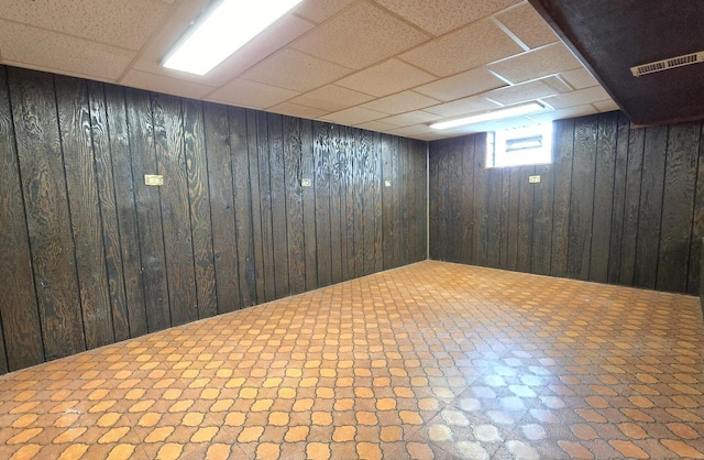 3544 Louis St, Franklin Park, IL 60131 - basement featuring wood walls and a paneled ceiling