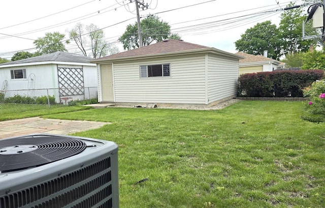 3544 Louis St, Franklin Park, IL 60131 - view of yard with central AC unit and an outbuilding