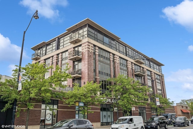 4020 N Damen Ave Unit 408, Chicago, IL 60618 - view of apartment building / complex
