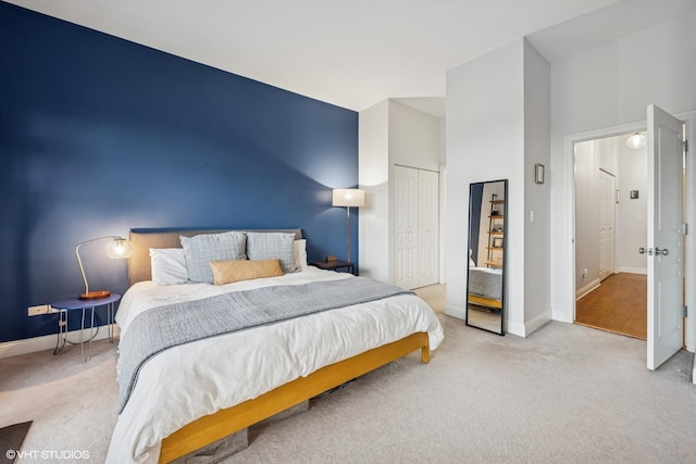 4020 N Damen Ave Unit 408, Chicago, IL 60618 - bedroom with carpet flooring, baseboards, and a closet