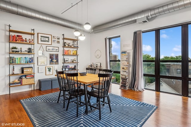 4020 N Damen Ave Unit 408, Chicago, IL 60618 - dining space with wood finished floors