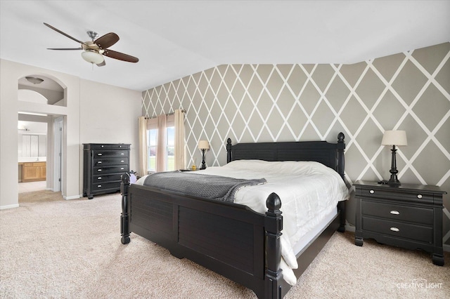 1104 Breckenridge Ln, Shorewood, IL 60404 - bedroom with light carpet, vaulted ceiling, ceiling fan, and connected bathroom