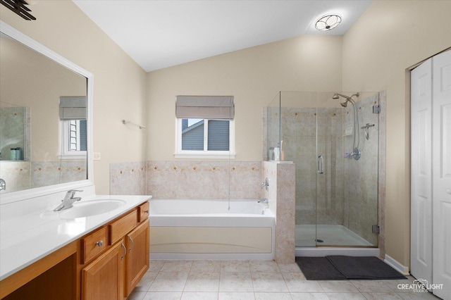 1104 Breckenridge Ln, Shorewood, IL 60404 - bathroom featuring lofted ceiling, a garden tub, vanity, a shower stall, and tile patterned floors