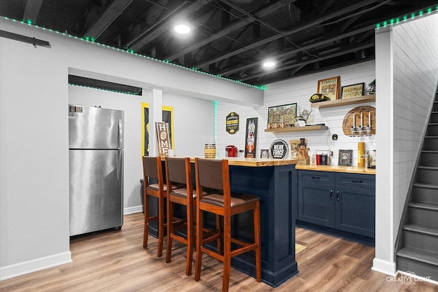 1104 Breckenridge Ln, Shorewood, IL 60404 - indoor bar featuring freestanding refrigerator and light wood-type flooring