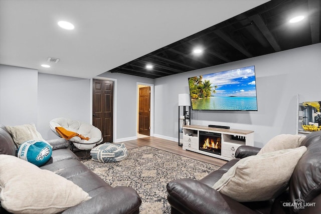 1104 Breckenridge Ln, Shorewood, IL 60404 - living room with wood finished floors, recessed lighting, and a warm lit fireplace