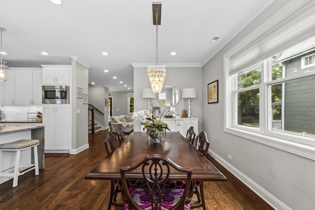 439 Thomas Ave, Forest Park, IL 60130 - dining area with a chandelier, stairway, crown molding, dark wood-type flooring, and recessed lighting