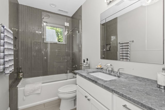 439 Thomas Ave, Forest Park, IL 60130 - full bathroom featuring vanity, shower / washtub combination, and wood finished floors