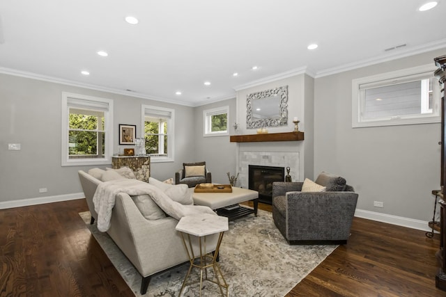 439 Thomas Ave, Forest Park, IL 60130 - living room with recessed lighting, a tile fireplace, wood finished floors, and crown molding