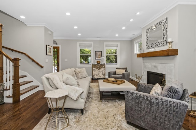 439 Thomas Ave, Forest Park, IL 60130 - living area featuring recessed lighting, wood finished floors, a fireplace, stairs, and crown molding