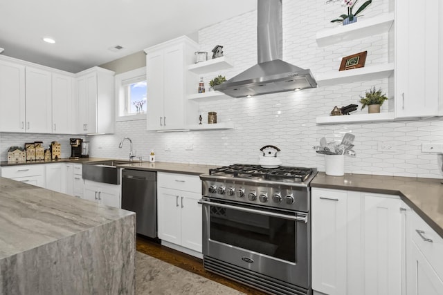 439 Thomas Ave, Forest Park, IL 60130 - kitchen with open shelves, stainless steel appliances, wall chimney exhaust hood, and decorative backsplash