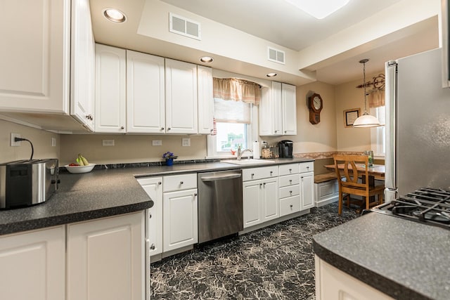 10 N Broadview Ave, Lombard, IL 60148 - kitchen featuring dishwasher, dark countertops, white cabinetry, a sink, and recessed lighting