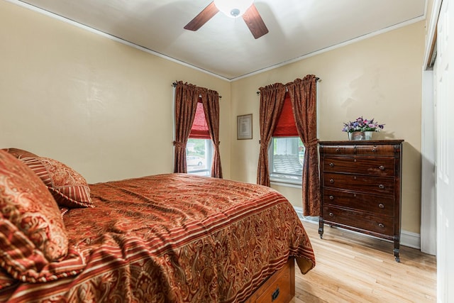 10 N Broadview Ave, Lombard, IL 60148 - bedroom featuring light wood-style flooring, ornamental molding, a ceiling fan, and baseboards