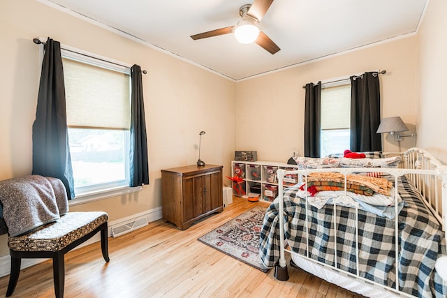 10 N Broadview Ave, Lombard, IL 60148 - bedroom with ornamental molding, light wood-style flooring, ceiling fan, and baseboards
