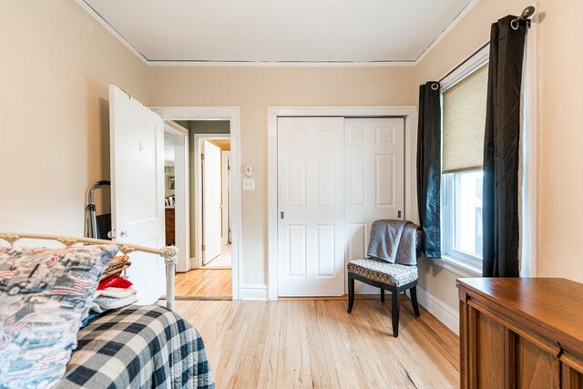 10 N Broadview Ave, Lombard, IL 60148 - bedroom featuring light wood finished floors, crown molding, baseboards, and a closet