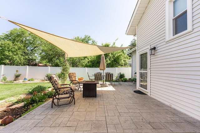 10 N Broadview Ave, Lombard, IL 60148 - fenced backyard featuring a fire pit and a patio area