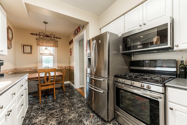 10 N Broadview Ave, Lombard, IL 60148 - kitchen with appliances with stainless steel finishes, white cabinets, pendant lighting, and light countertops