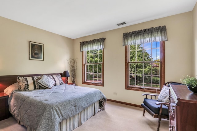 801 Fieldale Ln, Grayslake, IL 60030 - bedroom with light carpet and baseboards
