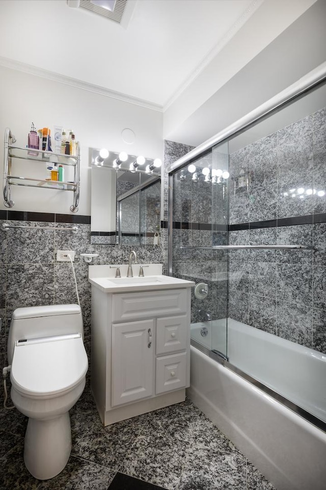 9330 Kolmar Ave, Skokie, IL 60076 - bathroom with toilet, vanity, crown molding, combined bath / shower with glass door, and tile walls