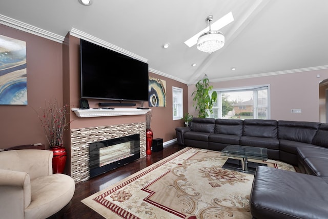 9330 Kolmar Ave, Skokie, IL 60076 - living area with a skylight, lofted ceiling, wood finished floors, a fireplace, and crown molding