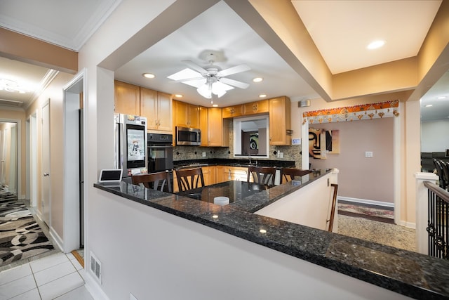 9330 Kolmar Ave, Skokie, IL 60076 - kitchen with stainless steel appliances, crown molding, baseboards, tasteful backsplash, and ceiling fan