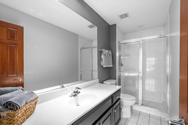 800 Diamond Head Dr E, Shorewood, IL 60404 - full bath with toilet, vanity, a stall shower, and tile patterned flooring