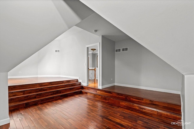 800 Diamond Head Dr E, Shorewood, IL 60404 - bonus room featuring hardwood / wood-style floors, vaulted ceiling, and baseboards