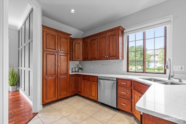 800 Diamond Head Dr E, Shorewood, IL 60404 - kitchen featuring stainless steel dishwasher, a sink, decorative backsplash, recessed lighting, and brown cabinetry