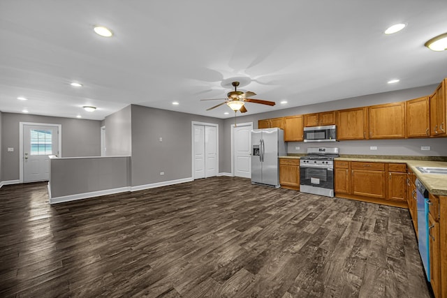 20738 S Hickory Creek Ct, Frankfort, IL 60423 - kitchen with appliances with stainless steel finishes, dark wood-type flooring, brown cabinets, recessed lighting, and a ceiling fan