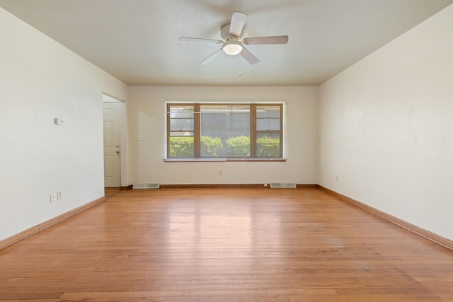 3229 Liberty Dr, Rockford, IL 61101 - empty room with ceiling fan, light wood finished floors, and baseboards