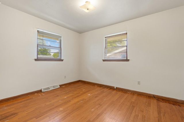 3229 Liberty Dr, Rockford, IL 61101 - spare room with baseboards and light wood-style floors
