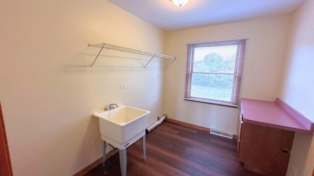 3420 203rd St, Olympia Fields, IL 60461 - laundry area featuring dark wood-style floors and baseboards