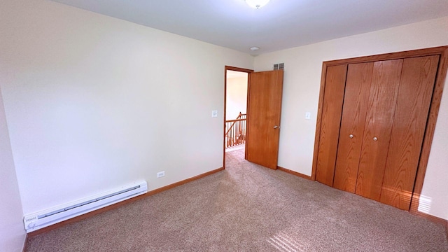 3420 203rd St, Olympia Fields, IL 60461 - unfurnished bedroom with a baseboard heating unit, carpet, a closet, and baseboards