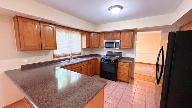 3420 203rd St, Olympia Fields, IL 60461 - kitchen with black appliances, a sink, a peninsula, dark countertops, and light tile patterned floors