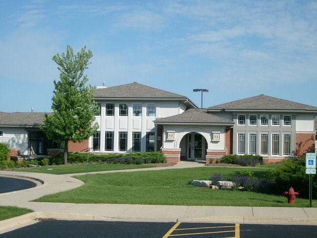 520 Carriage Way S, Elgin, IL 60177 - back of house with a lawn and uncovered parking