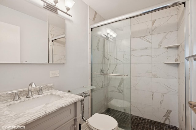 3550 N Lake Shore Dr Unit 1901, Chicago, IL 60657 - bathroom featuring toilet, a stall shower, and vanity