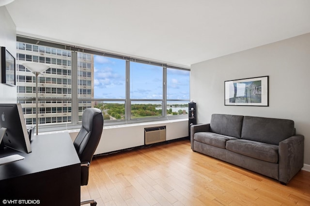 3550 N Lake Shore Dr Unit 1901, Chicago, IL 60657 - office area with wood finished floors and a wall mounted AC