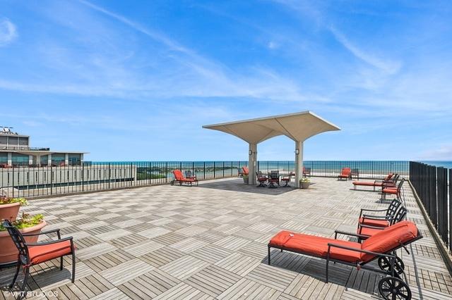 3550 N Lake Shore Dr Unit 1901, Chicago, IL 60657 - view of patio with a water view